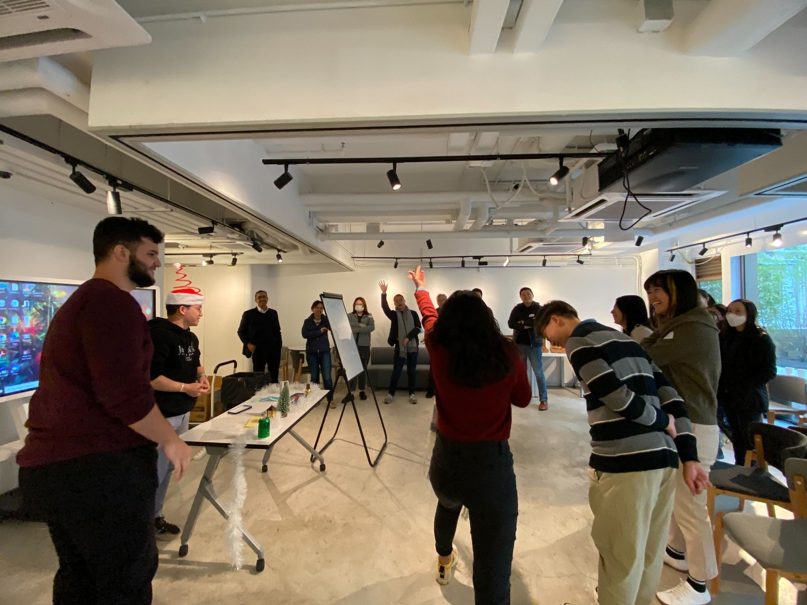 DrivenWonder team collaborating in a modern office